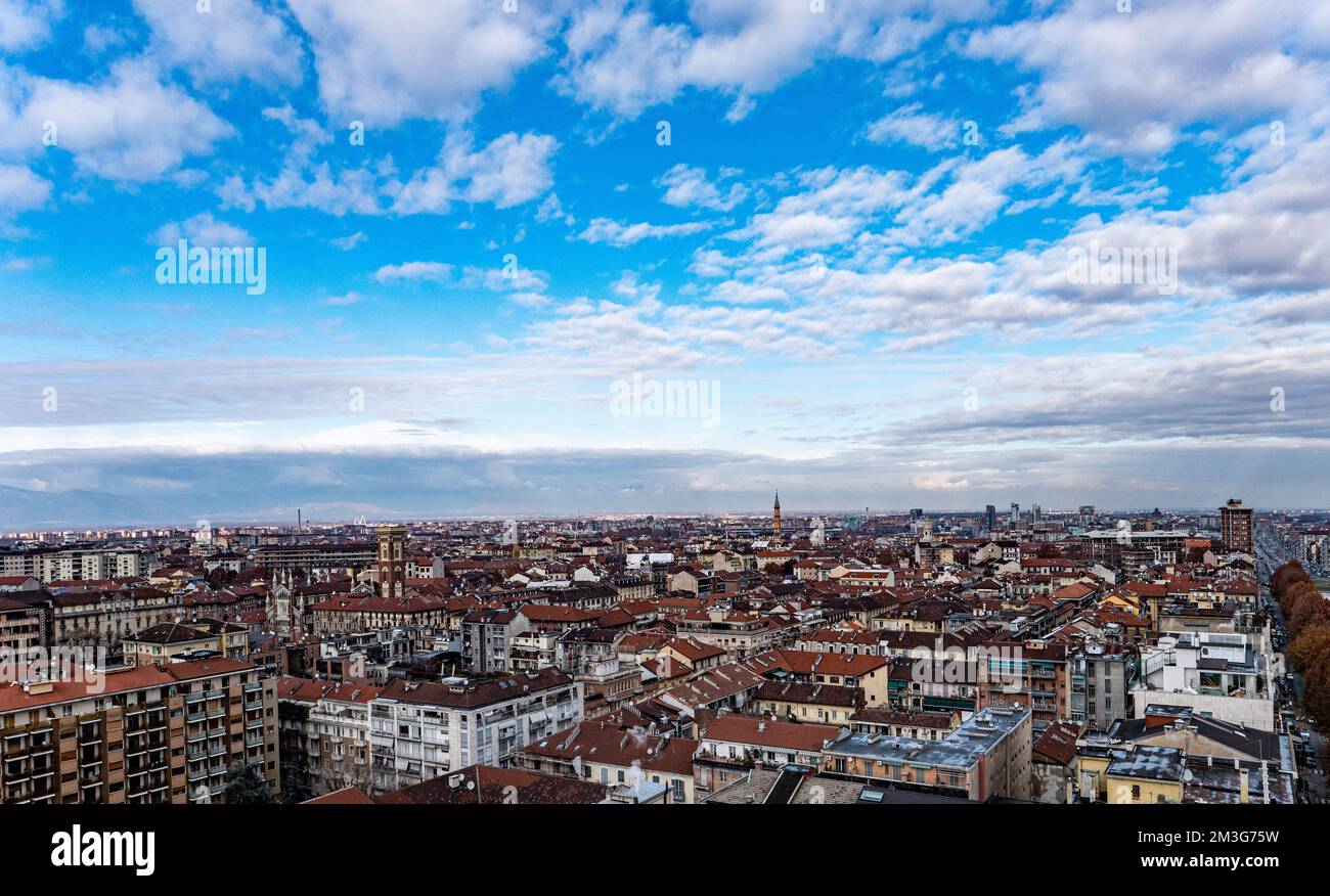 Skyline of Turin, Italy, in winter. The mountain in back and the Mole Antonelliana, Piazza Castello, Porta Susa Station, Turin court and the city cent Stock Photo