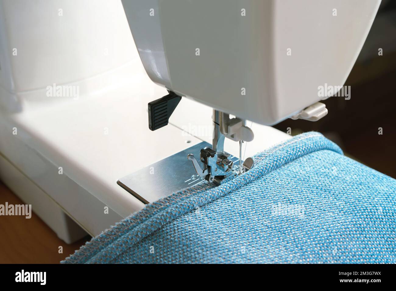 Professional equipment. Modern sewing machine with special pressure