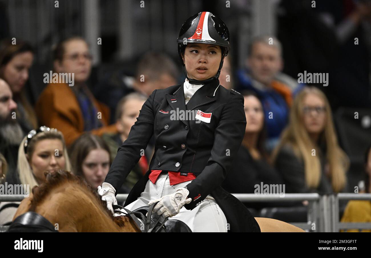 Royal Victoria Dock, United Kingdom. 15th Dec, 2022. London International Horse Show. Excel London. Royal Victoria Dock. Caroline Chew (SGP) riding Tribiani during the FEI Dressage World Cup (Short Grand Prix). Credit: Sport In Pictures/Alamy Live News Stock Photo