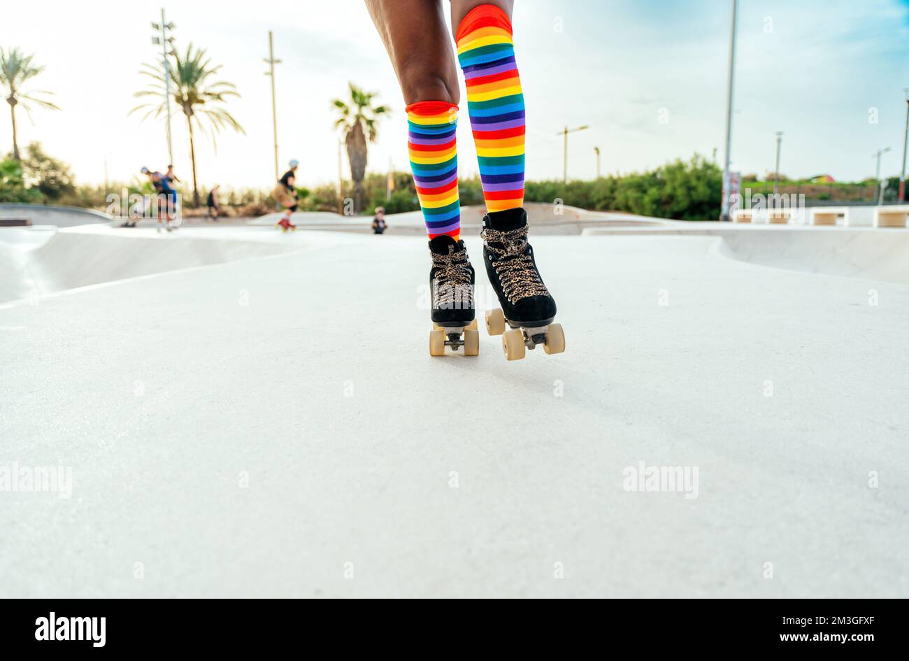 Beautiful woman skating with roller skates and having fun. Professional
