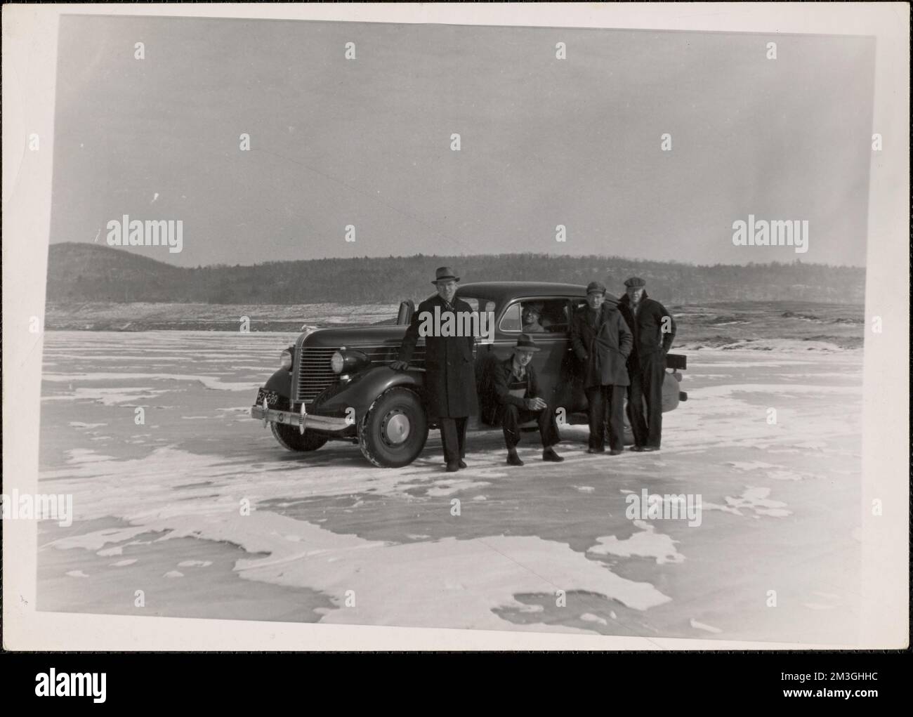 MDWSC engineers, with car, on frozen reservoir, Quabbin Reservoir, Mass., ca. 1940 , waterworks, reservoirs water distribution structures, engineers Stock Photo