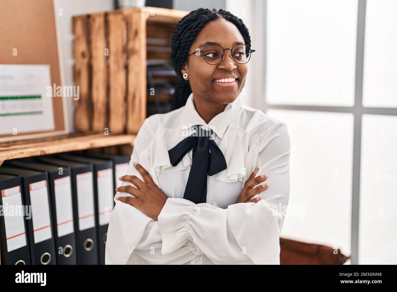 African american woman business worker smiling confident standing with ...