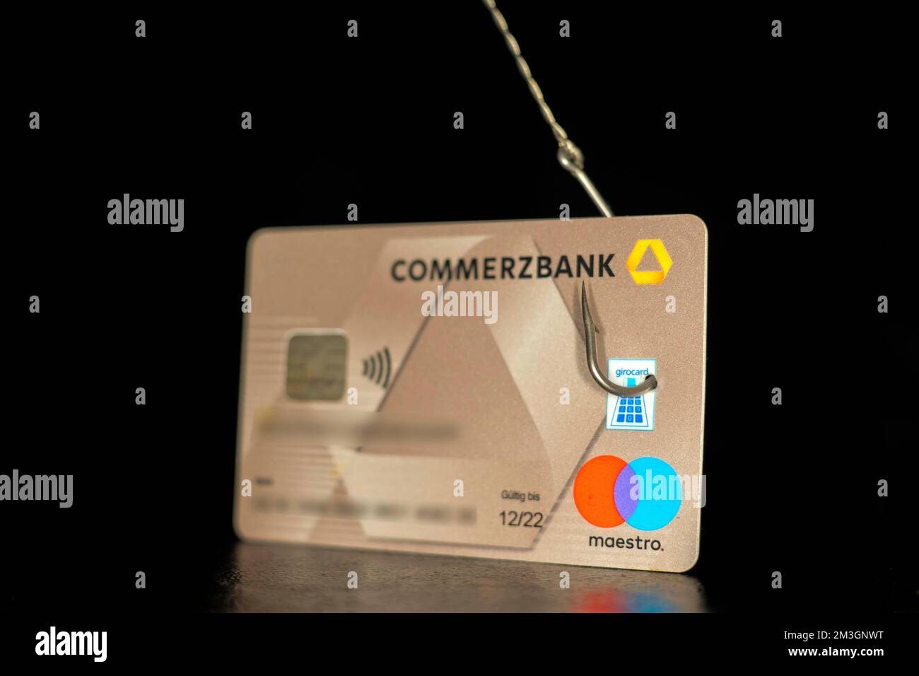 Bank data phishing symbol photo, bank card with fishhook, studio ...