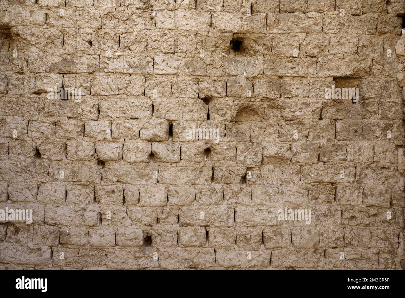 Mud-Brick walls at Ptolemaic temple , Deir el-Medina, worker's village near Valley of The Kings, West Bank of Nile, Luxor, Egypt Stock Photo
