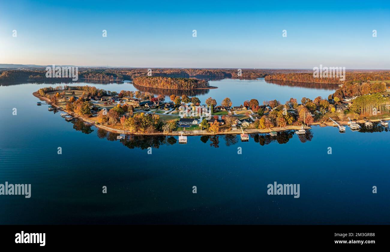 High resolution aerial view panorama of lakefront homes, boat docks and