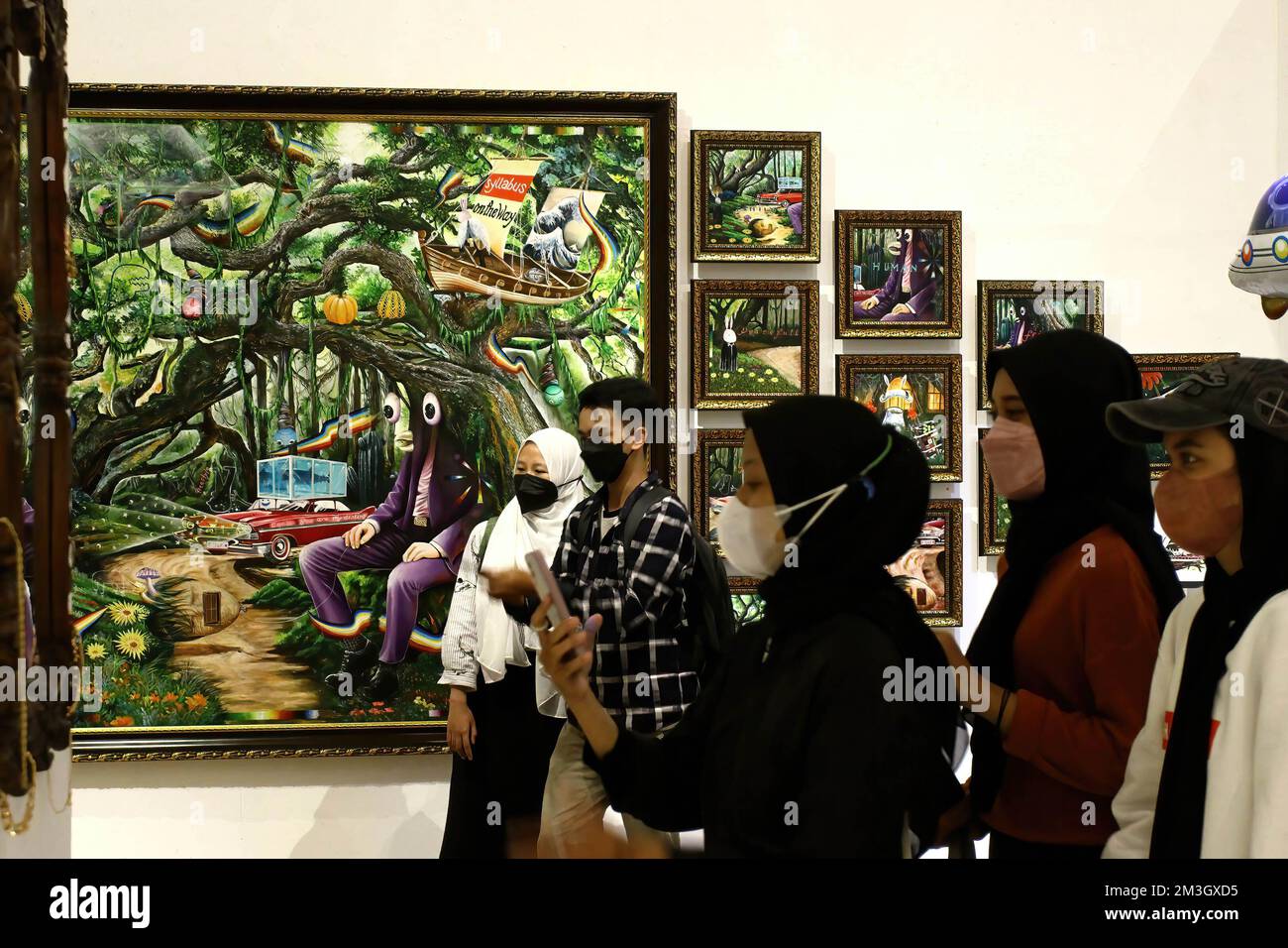 Yogyakarta, Indonesia. 15th Dec, 2022. A visitor takes photos of the