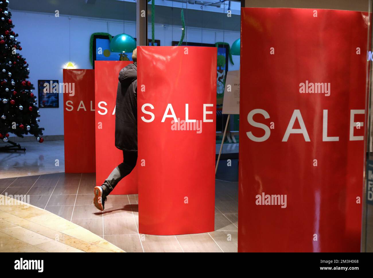 Sales in a clothing store in the days after Christmas Stock Photo Alamy