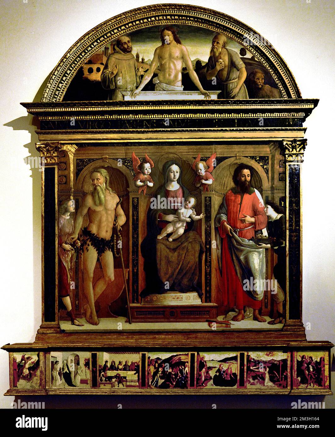 Madonna and Child with Saints , Saint Onofrio and Saint  Bartolomeo Christian by Pietro di Francesco Orioli,  1458–1496  Italian painter of the Renaissance period. Italy, Italian. Stock Photo