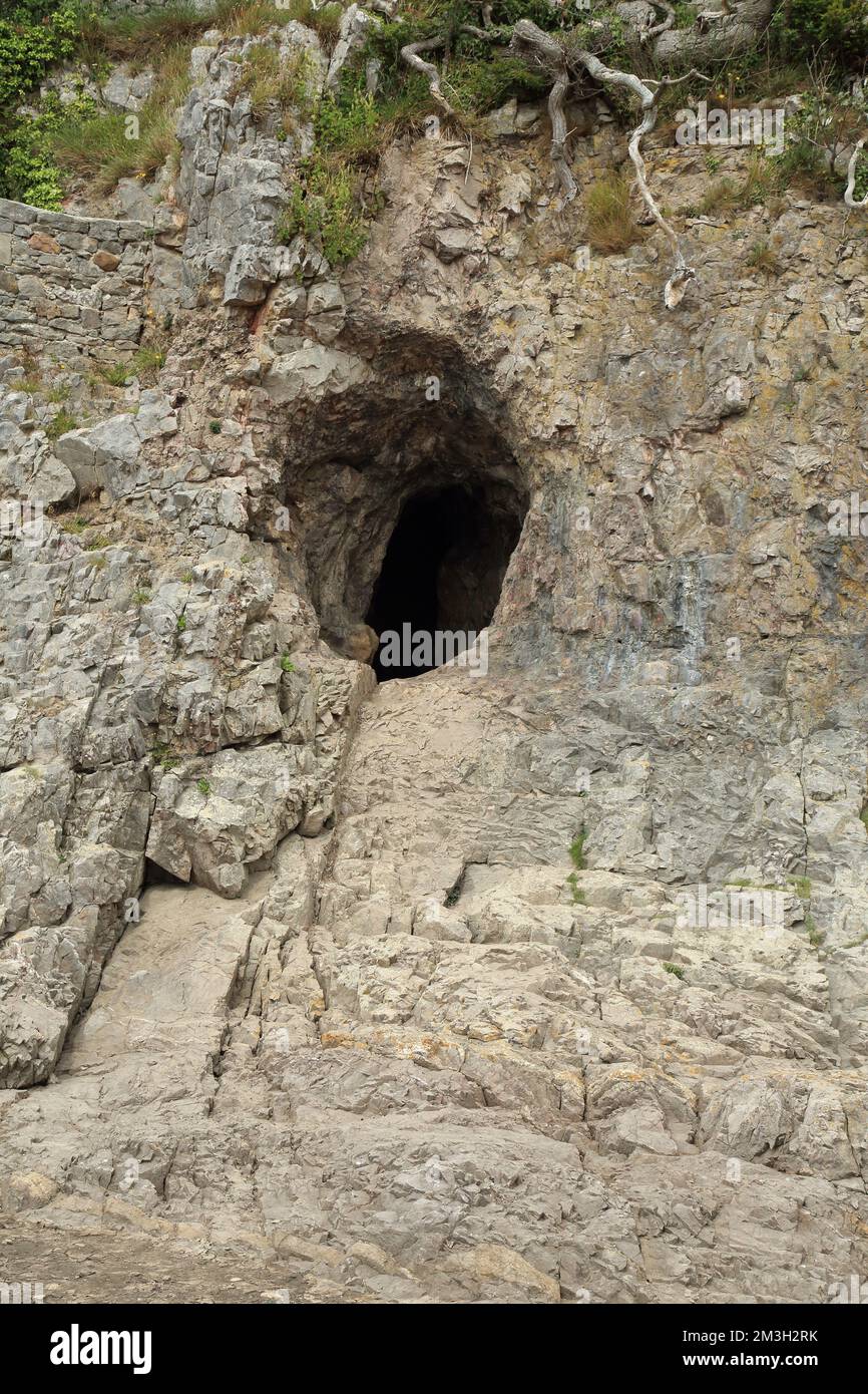 Cave in rock face at Silverdale Cover, Silverdale, Cumbria, England ...