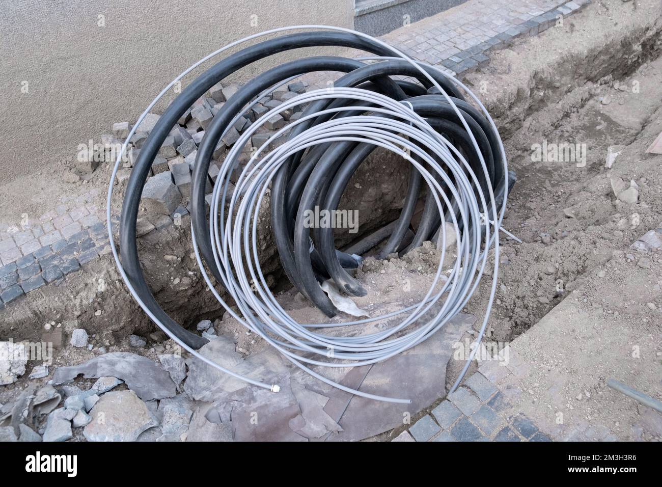 Fiber optic cables connecting infrastructure installation. Construction