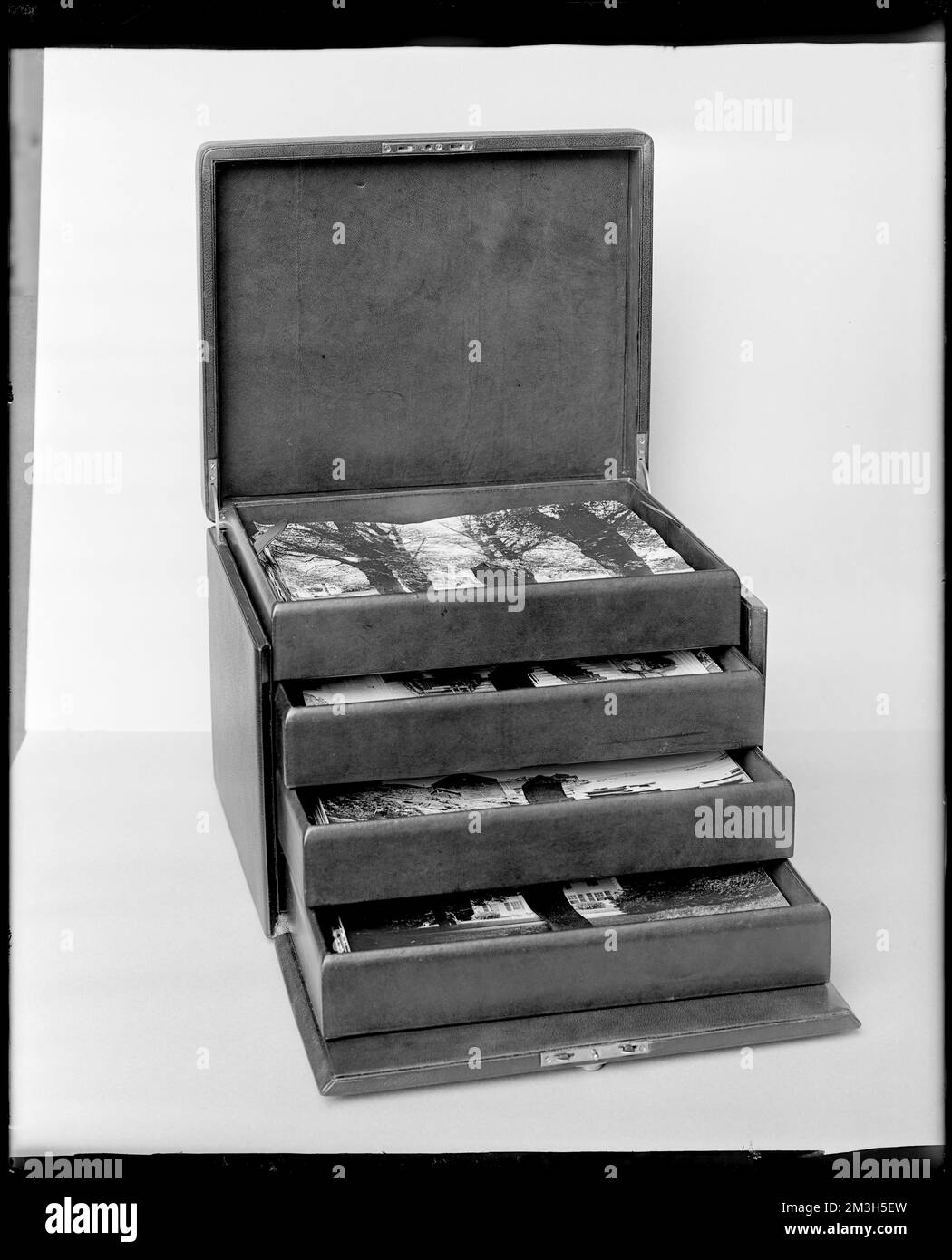 Miscellaneous, red box containing photos , Boxes, Photographs. Frank