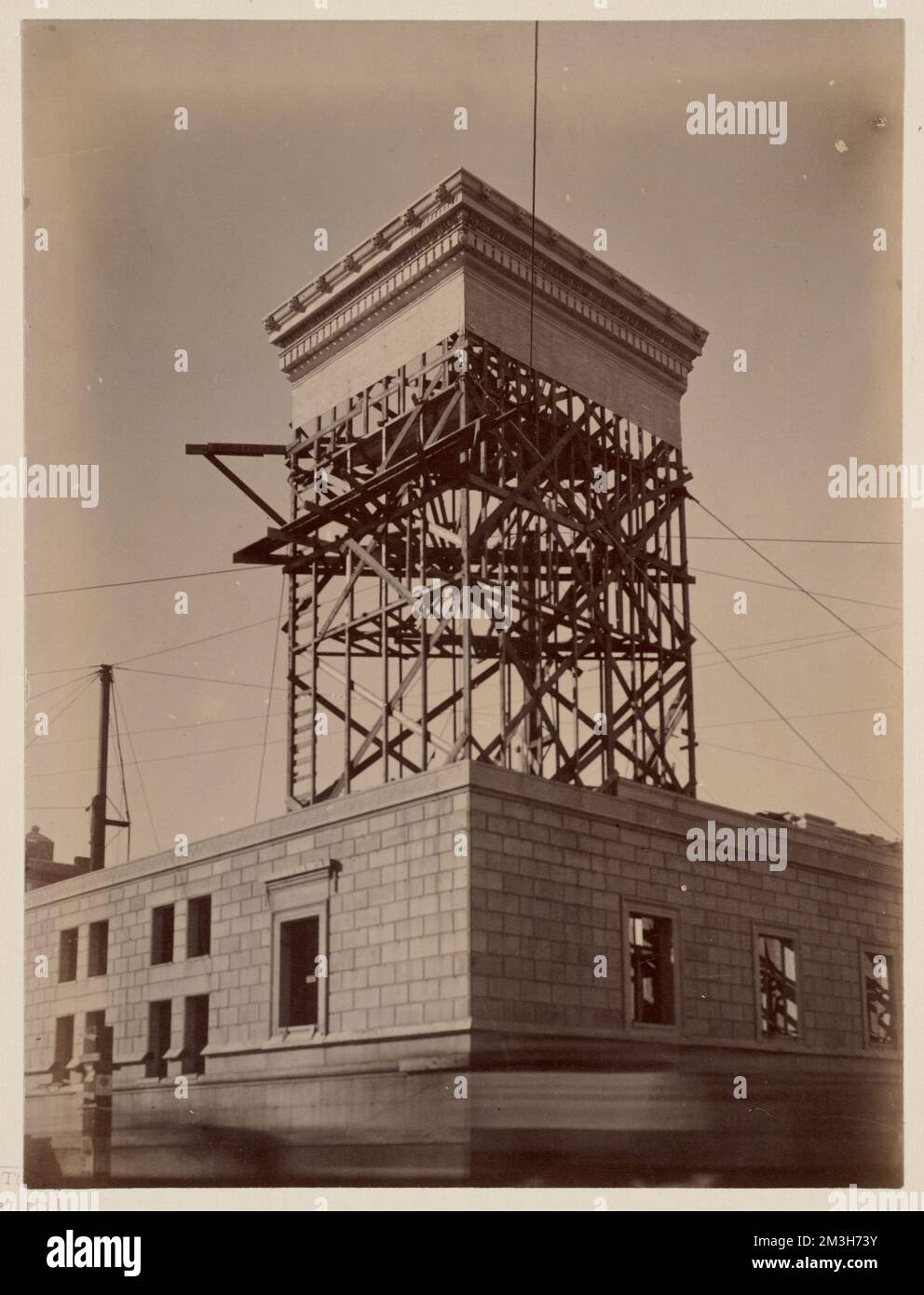 Mock-up of cornice on scaffolding, construction of the McKim Building ...