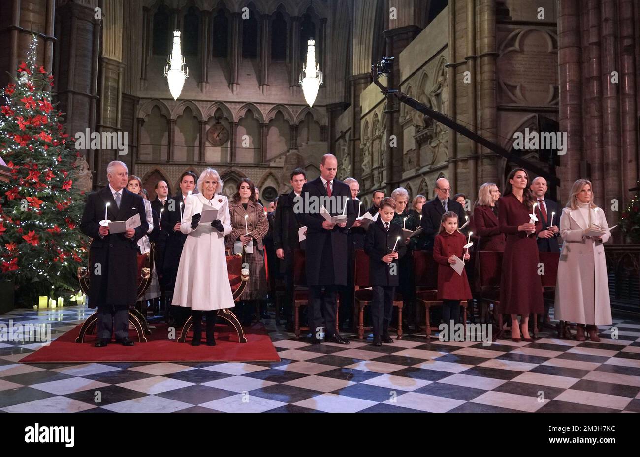 (Front row left to right) King Charles III, the Queen Consort, the Prince of Wales, Prince George, Princess Charlotte, the Princess of Wales and the Countess of Wessex during the 'Together at Christmas' Carol Service at Westminster Abbey in London. Picture date: Thursday December 15, 2022. Stock Photo