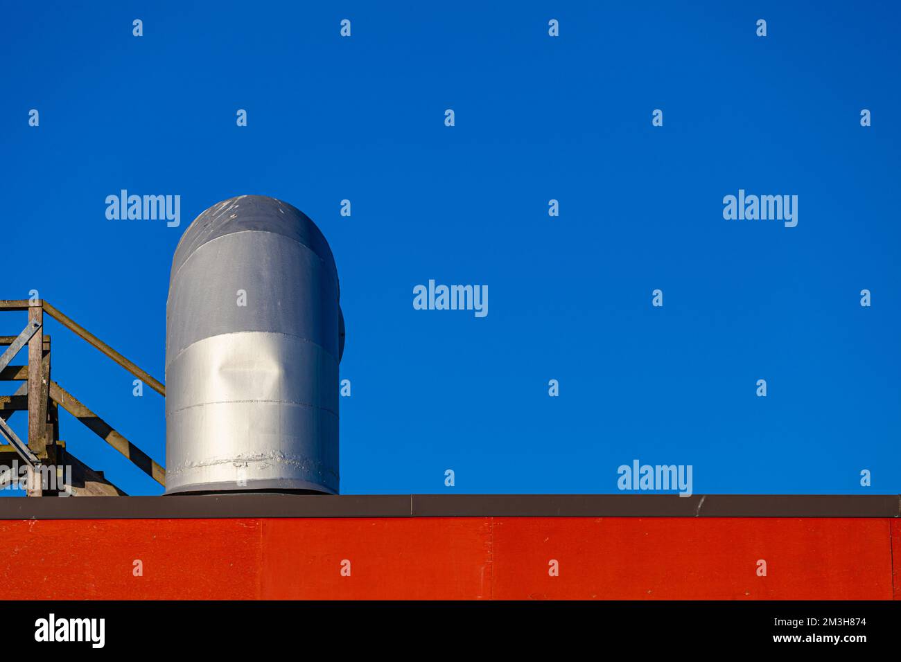 Abstract roofline image with vent stack in Steveston British Columbia Canada Stock Photo