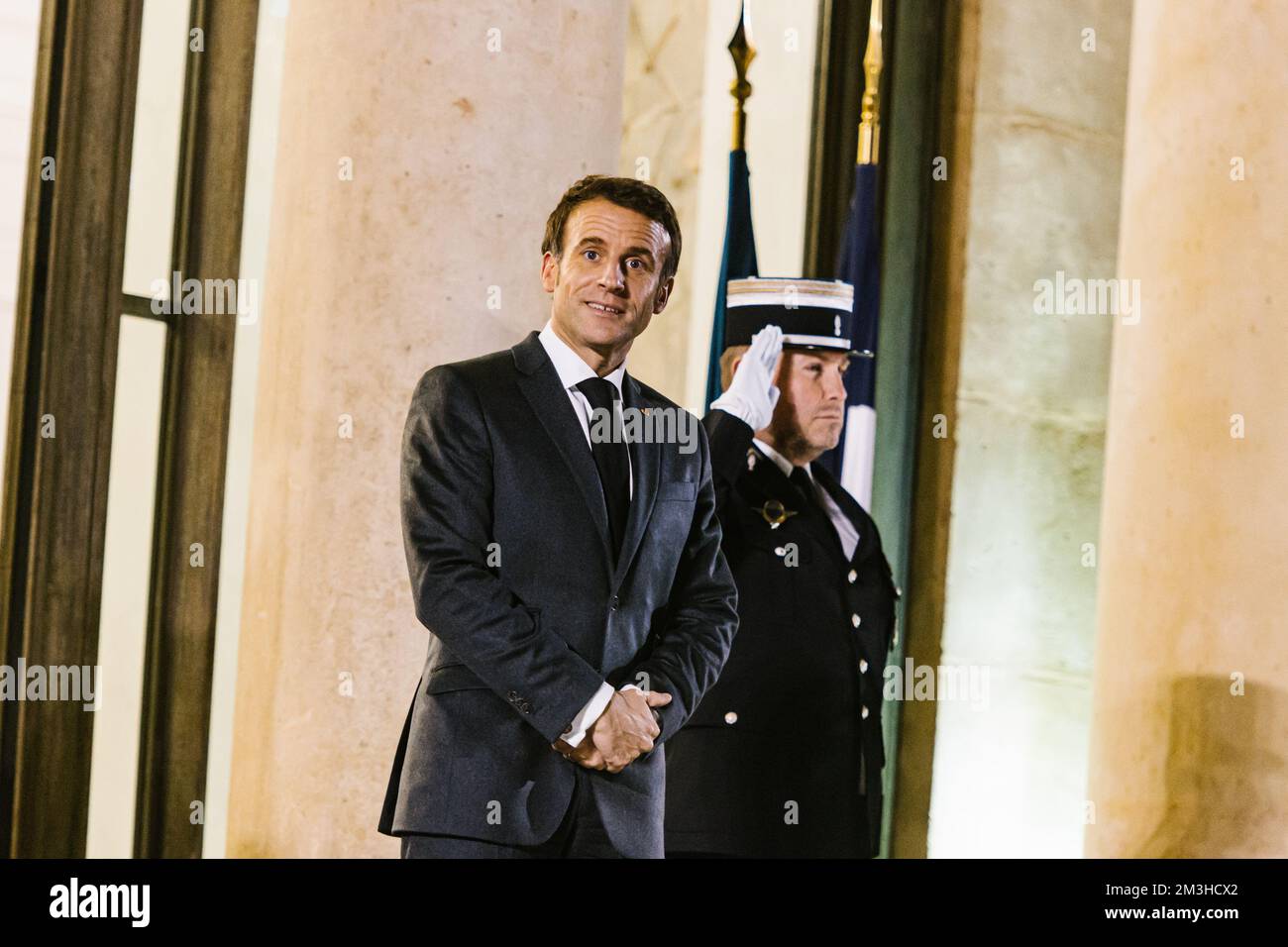 Paris, Ile de France, France. 15th Dec, 2022. Emmanuel Macron waits on the steps of the Elysee. French President of the Republic Emmanuel Macron welcomes Cambodia Prime Minister and President of the ASEAN, Hun Sen, at the Elysee Palace, in Paris, on December 13, 2022. Photo by Adrien Fillon. (Credit Image: © Adrien Fillon/ZUMA Press Wire) Credit: ZUMA Press, Inc./Alamy Live News Stock Photo