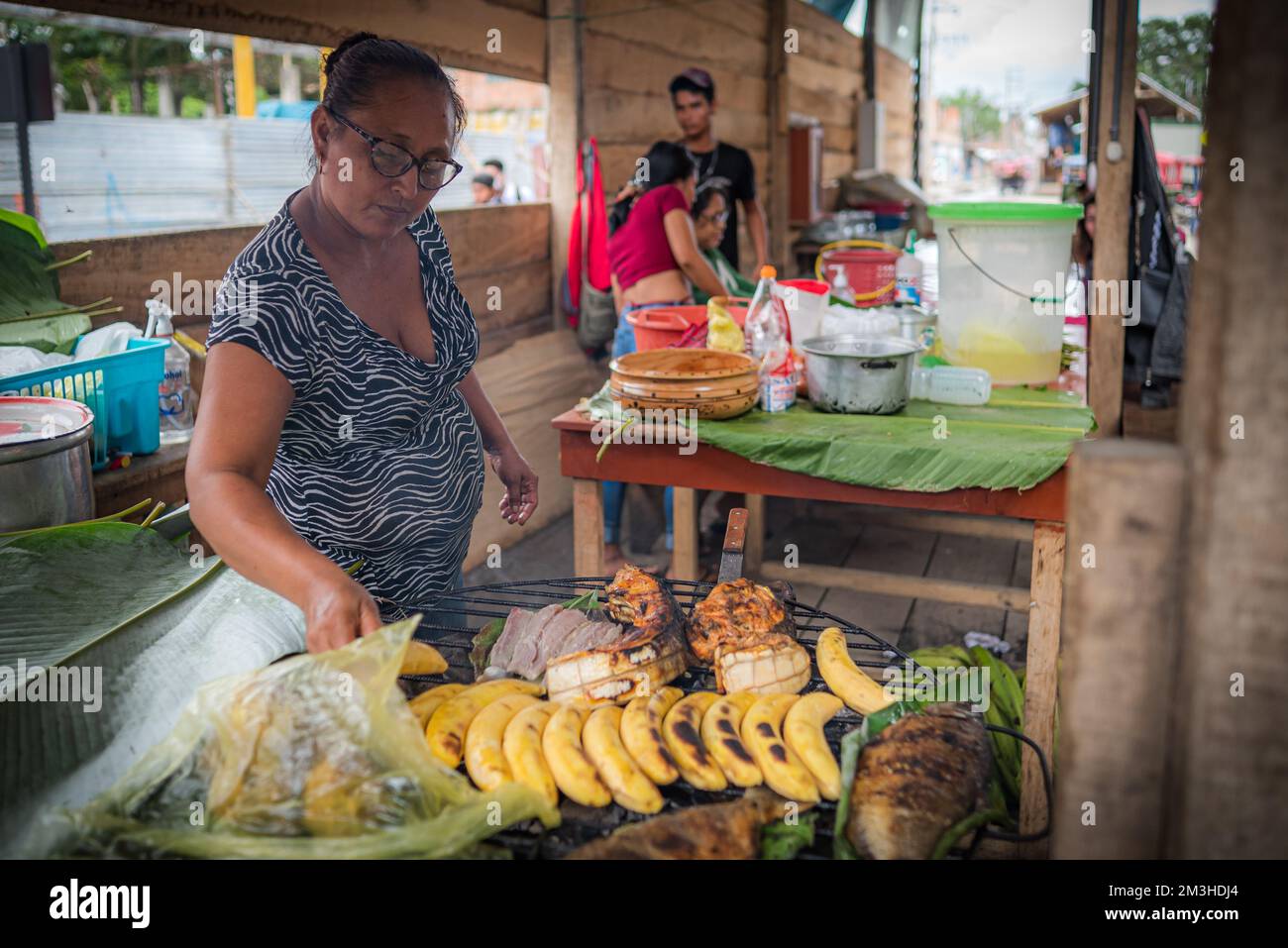 Woman selling rocks hi-res stock photography and images - Alamy