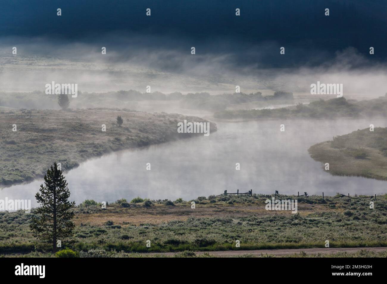 Misty mountain lake in the early serene morning in mountains Stock ...
