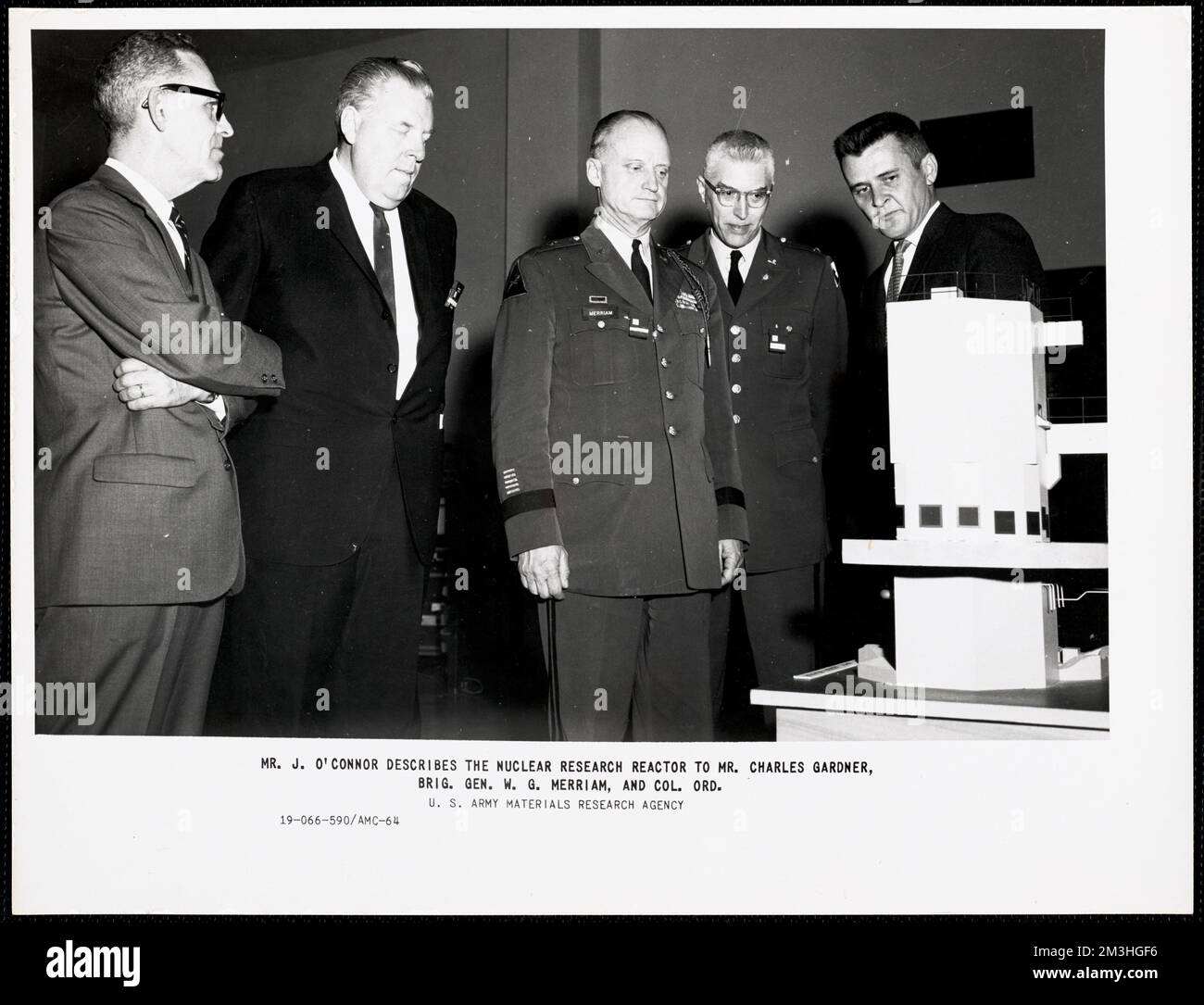 LT. COL. GEO. LUBEROFF, Chief Q.M. of the 1st Army, is pictured with some  of his assistants. In the front row, from left to right, are Lt. Cel.  Jeremiah Beall, Ord., Chief