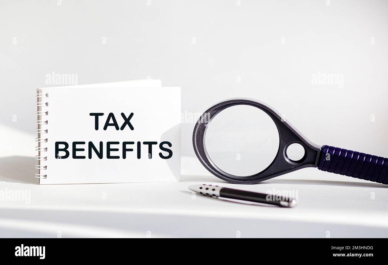 Finance and business concept. On a white background lies a magnifying