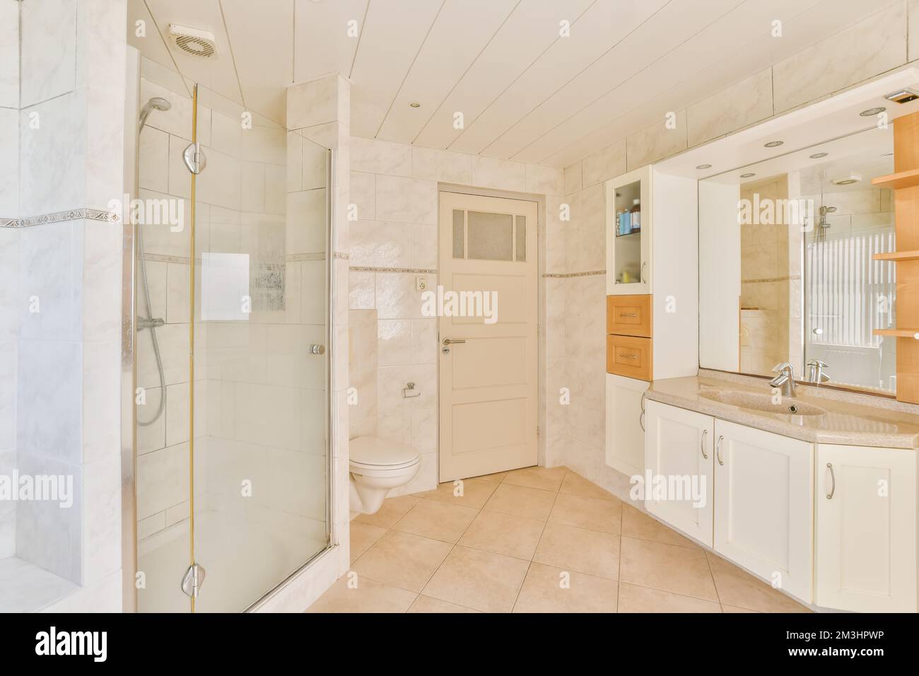 a bathroom that is very clean and ready for us to use as a shower stall or room in the house Stock Photo