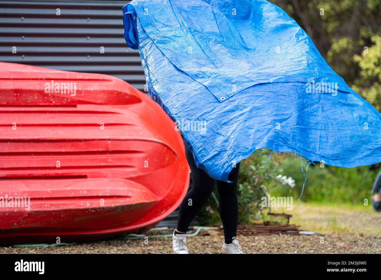sleeping under a tarp. hiking and camping with a blue tarp in america