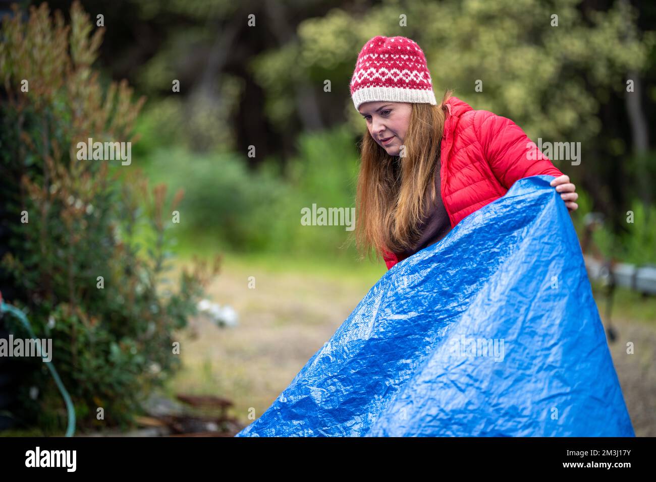 sleeping under a tarp. hiking and camping with a blue tarp in america