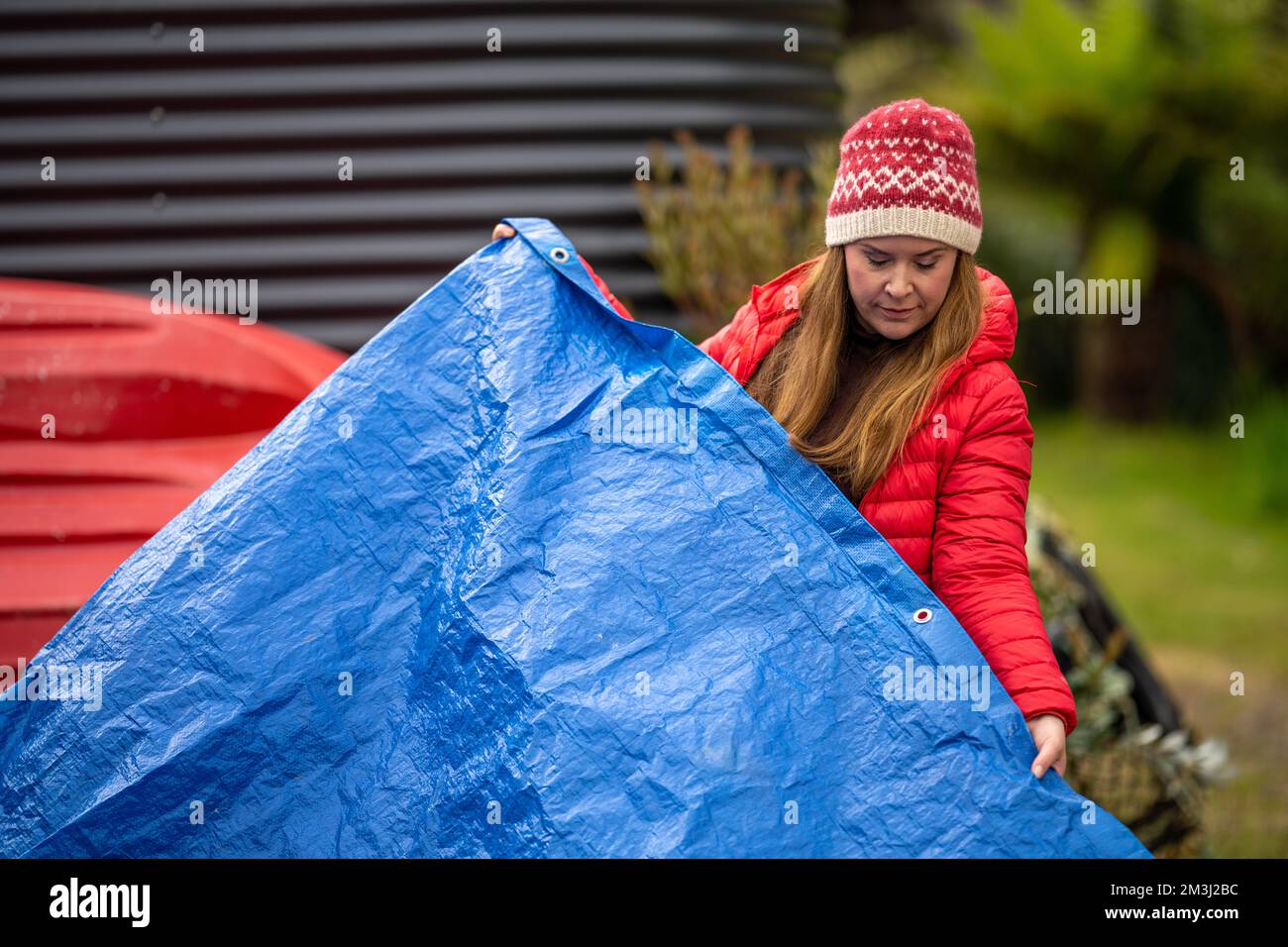 sleeping under a tarp. hiking and camping with a blue tarp in america