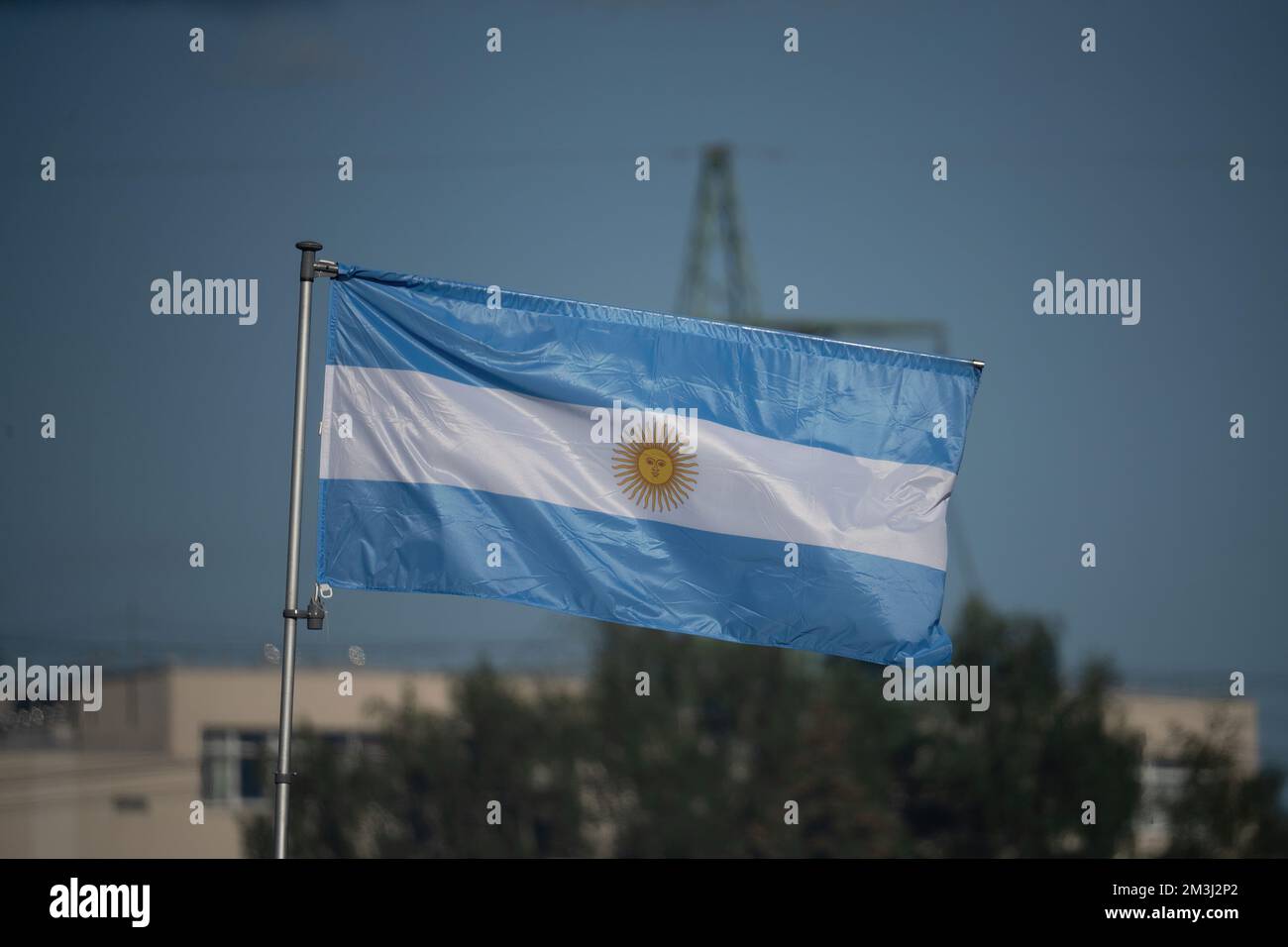 Argentina flag isolated on the blue sky with clipping path. close up waving flag of Argentina. flag symbols of Argentina. Stock Photo