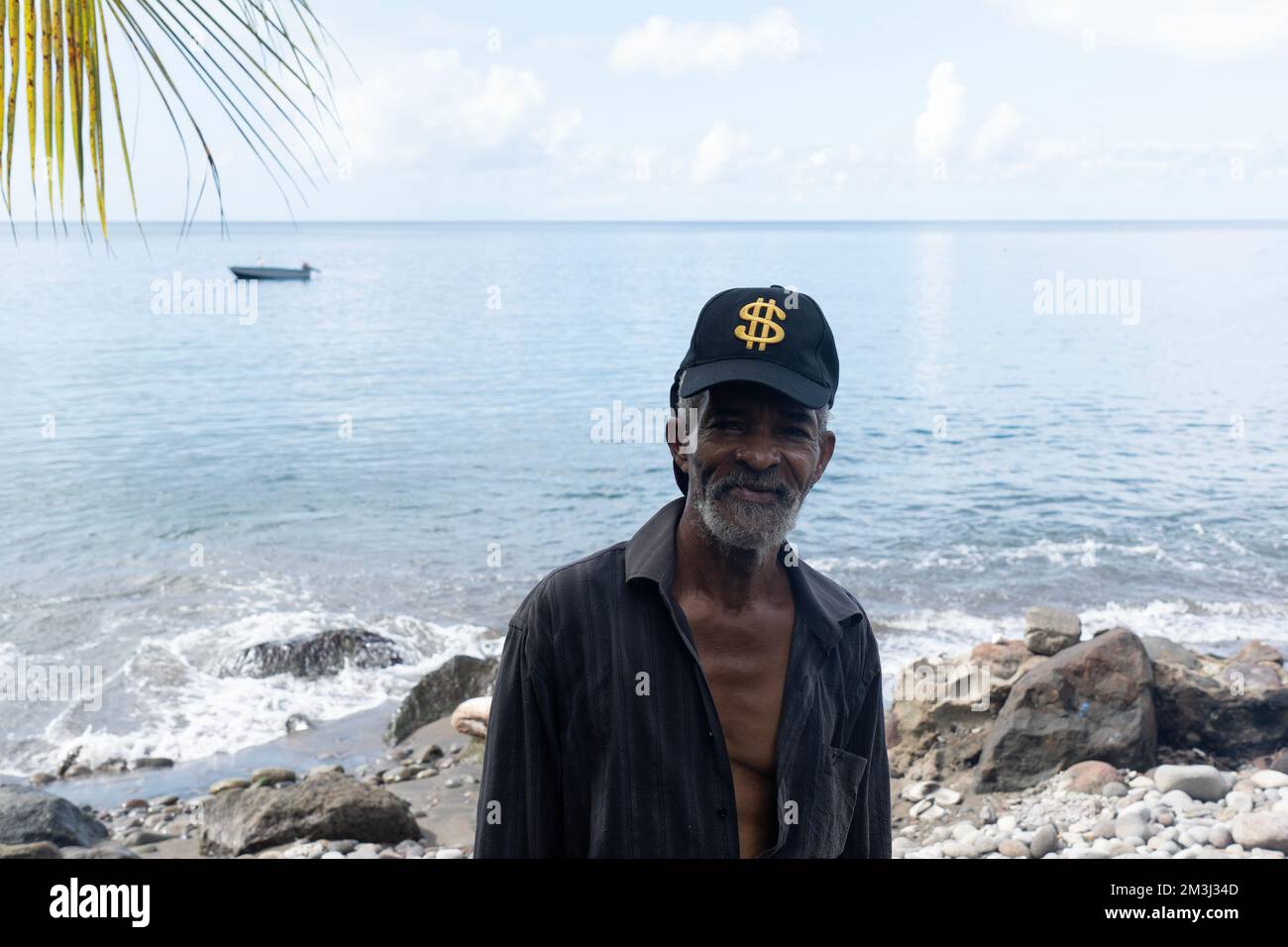 Dominica, Roseau - November 12 2022: Portrait of a senior man from