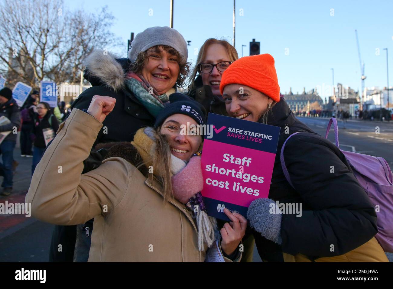 NHS nurses pose for a photo during a protest outside St. Thomas ...