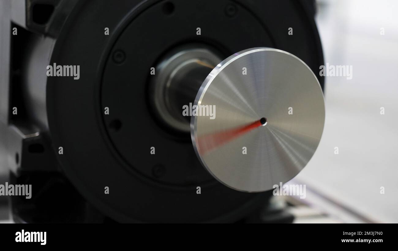 Rotating Metal machine with drum. Media. Rotating round part in