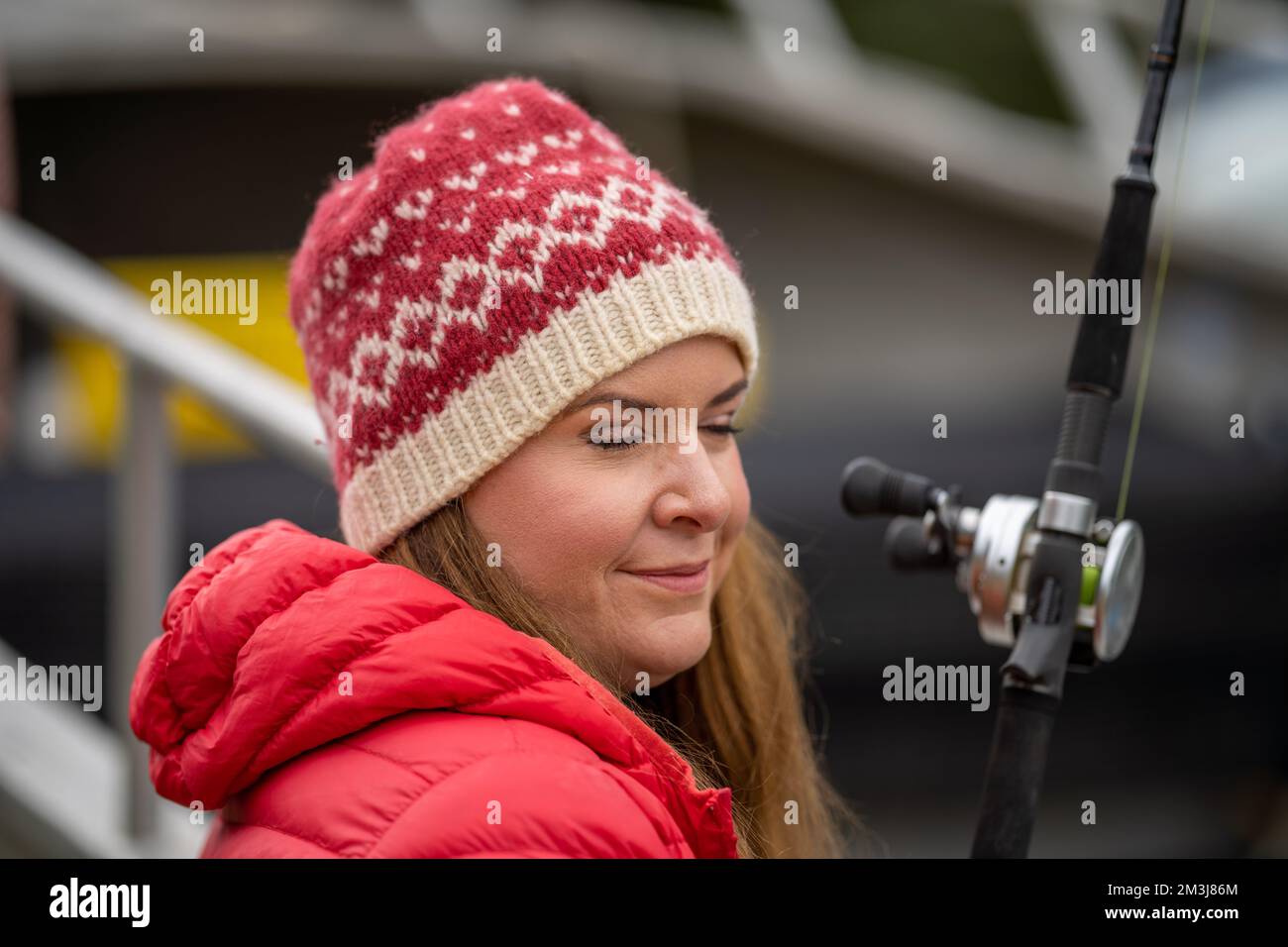 model girl fishing in a boat in summer in australia Stock Photo Alamy