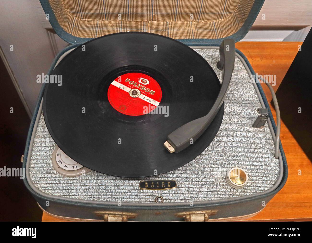 1960s Baird Record player, with Polygon vinyl 12' LP on the turntable Stock Photo