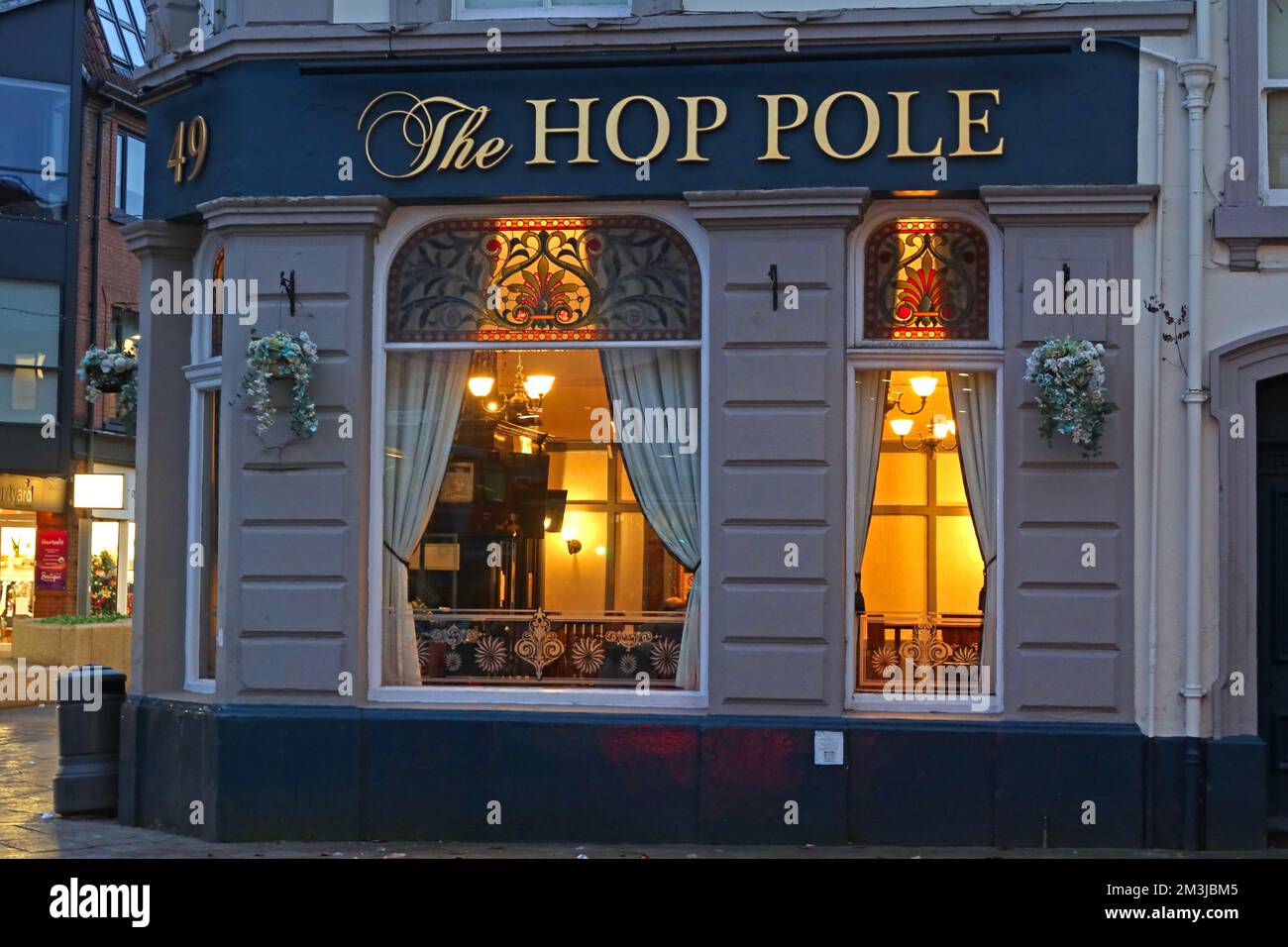 The Hop Pole pub at dusk, 9 Horsemarket St, Warrington, Cheshire, England, UK, WA1 1AJ Stock Photo