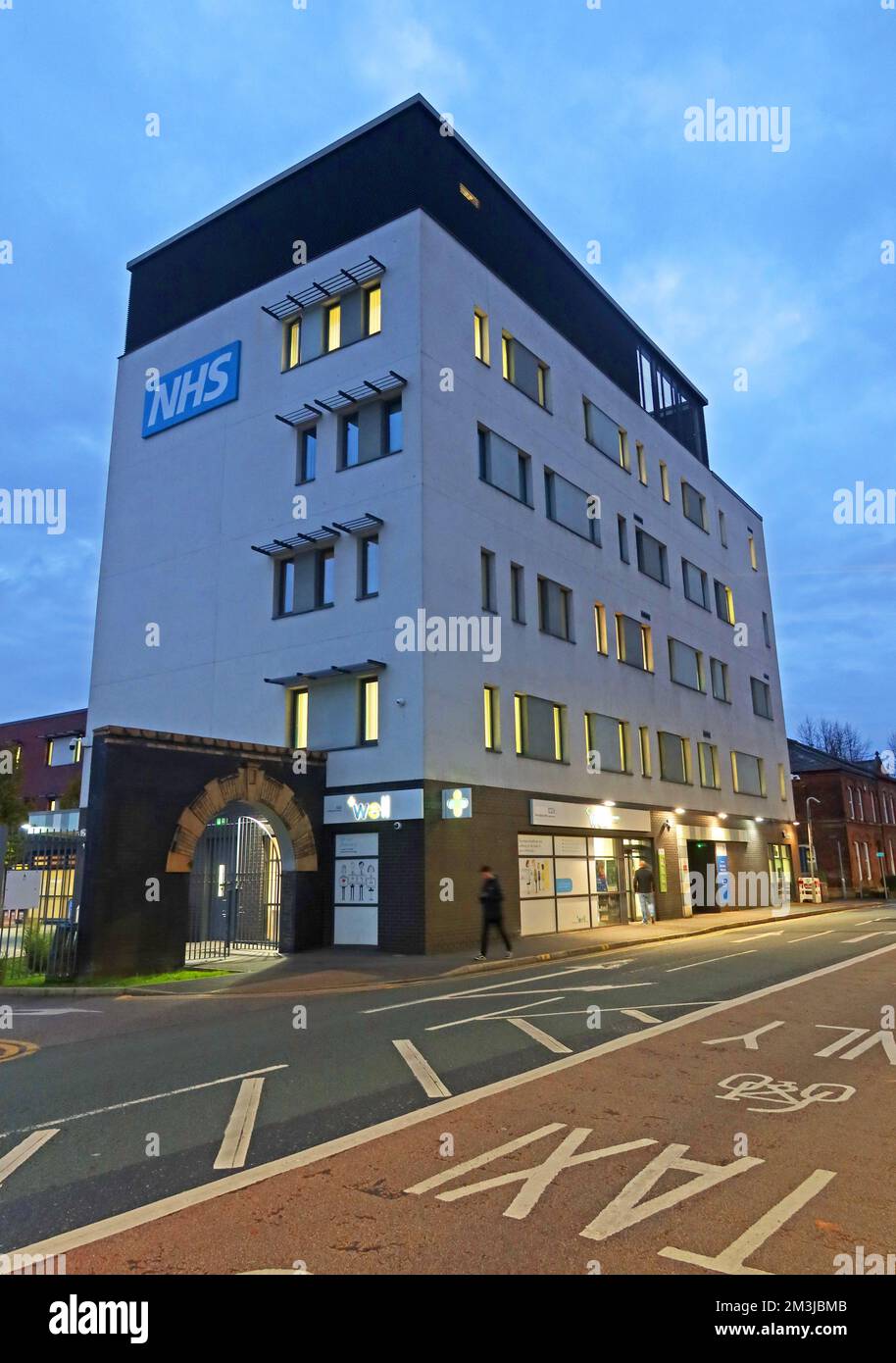 NHS Warrington Bath St building, Warrington and Halton Hospitals NHS Trust, WHHNHS, Cheshire, England, UK, WA1 1UG at night Stock Photo