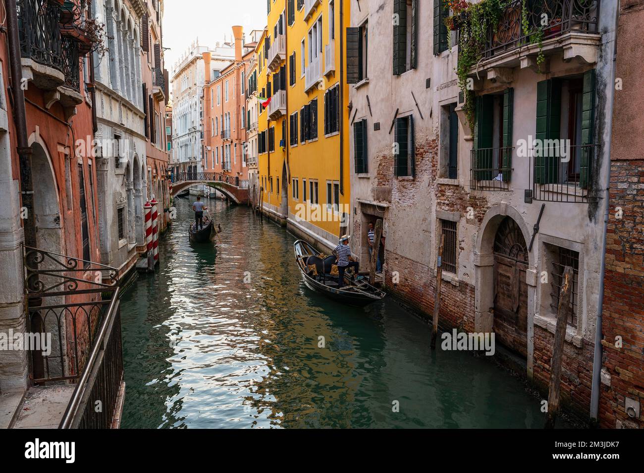 gondolas on a canal in Venice Stock Photo