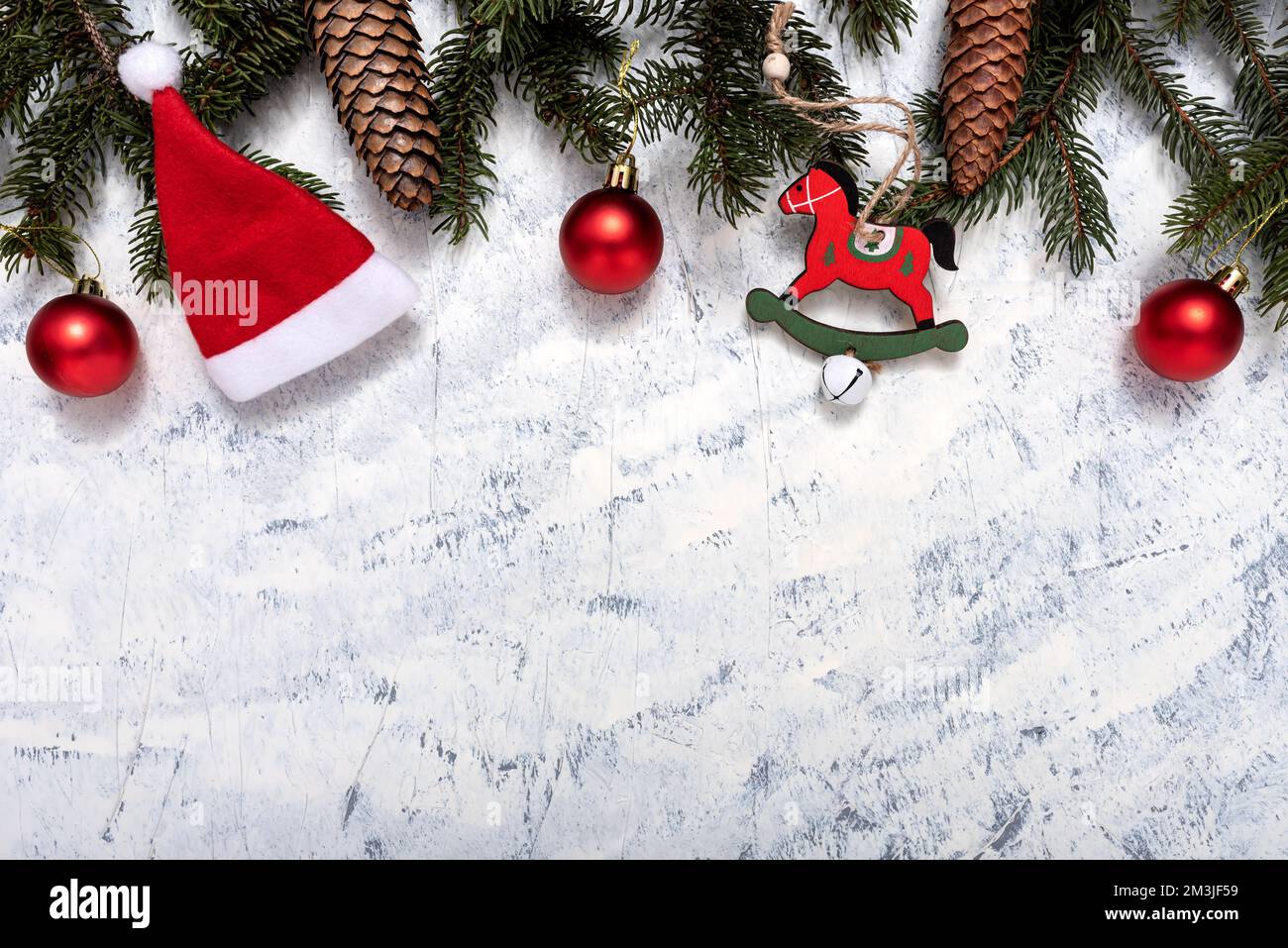 Christmas composition of fir tree branches, pine cones and Christmas ...