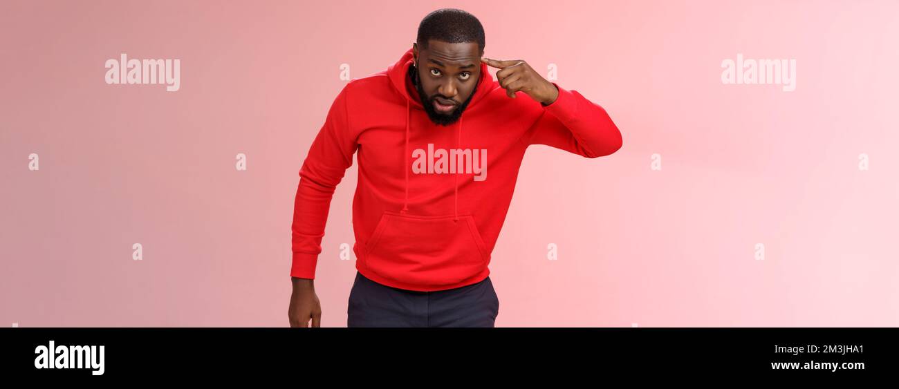 Pissed seriouslooking bothered africanamerican bearded man bending