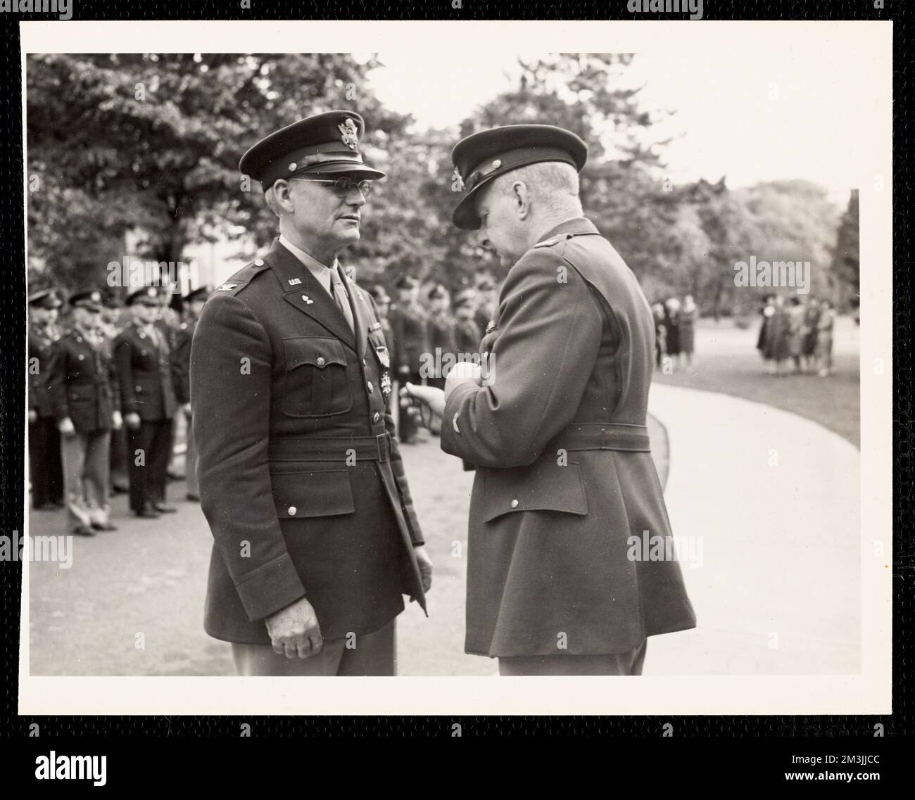 Officer pinning soldier at ceremony , Military parades & ceremonies, Military officers