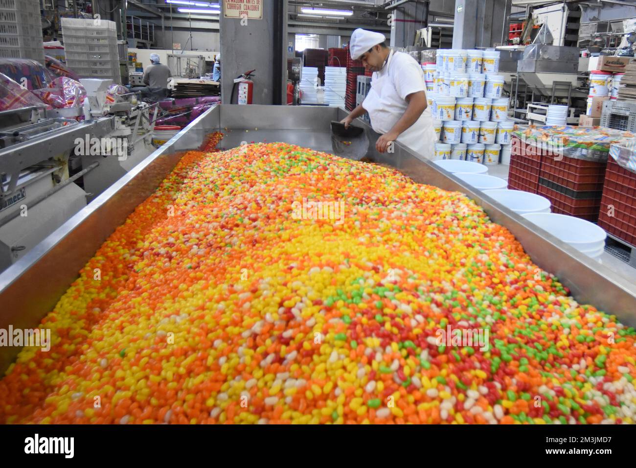 various colored Gummies stored in a candy factory Stock Photo Alamy