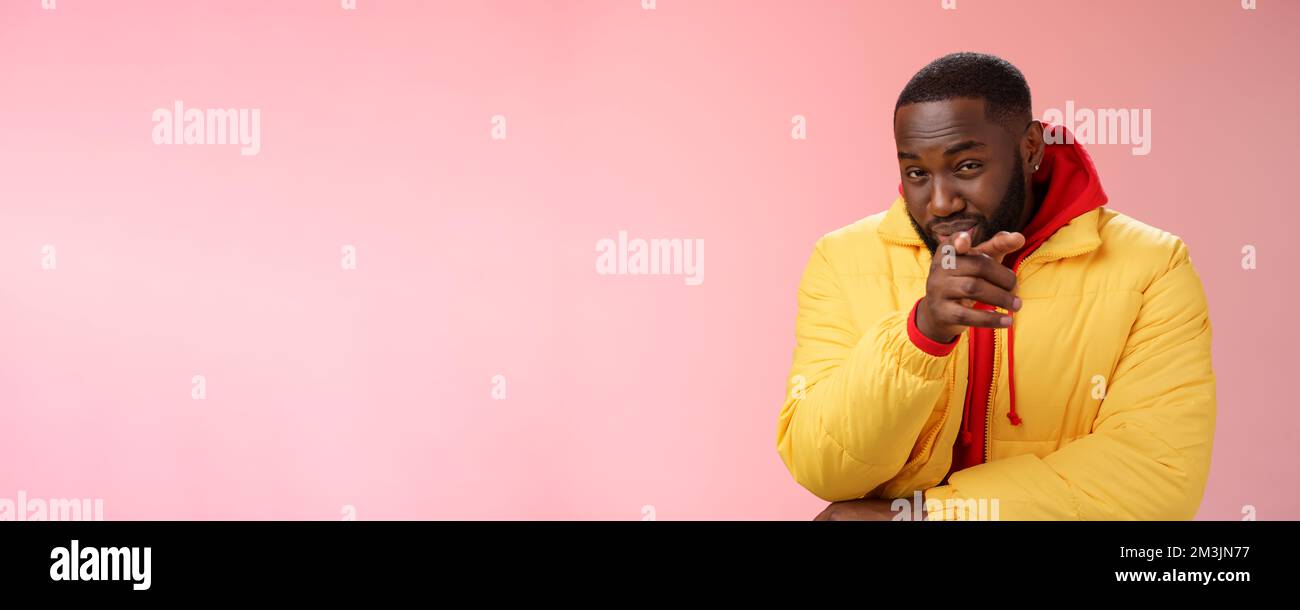 Guy suspecting you pointing camera index finger squinting disbelief unsure, standing pink background asking question look doubtful hesitant, express Stock Photo