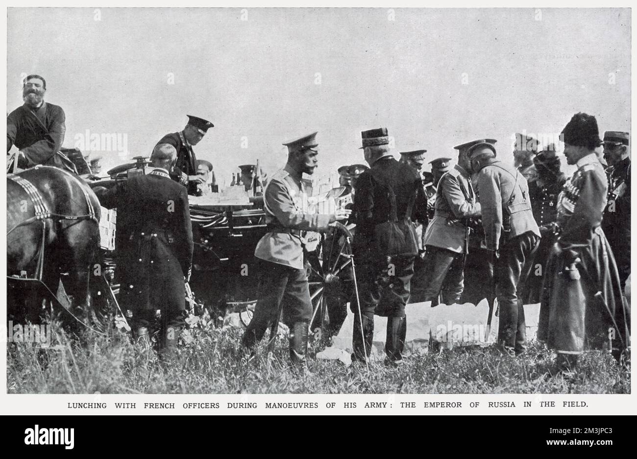 Tsar Nicholas II lunching with French officers during manoeuvres of his army. Russia was to form a triple alliance with France and Great Britain during World War I. Stock Photo