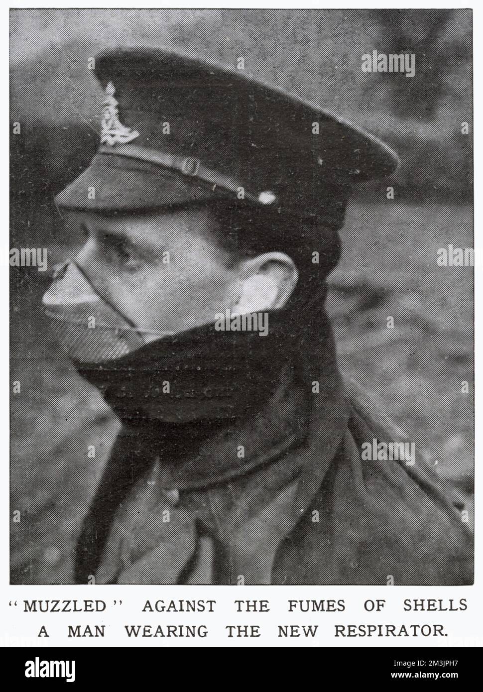 A British soldier wearing a respirator or gas-mask with an air-valve on the top. The Germans first used poisonous gas at Ypres on April 22nd 1915, defying the Hague Convention treaty of 1907 which they had signed. Stock Photo