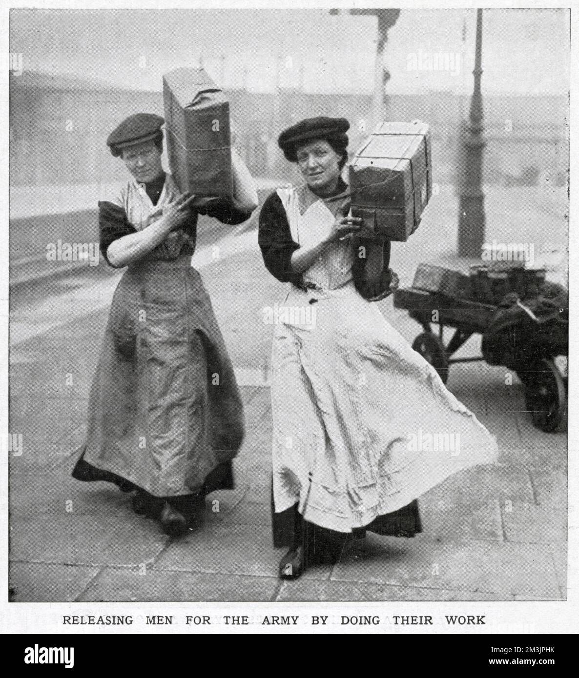 Two women railway porters in 1915. As World War I progressed, women began to work in traditionally male jobs as part of the war effort. This development was instrumental in women gaining the vote shortly after the end of the war.     Date: 1915 Stock Photo