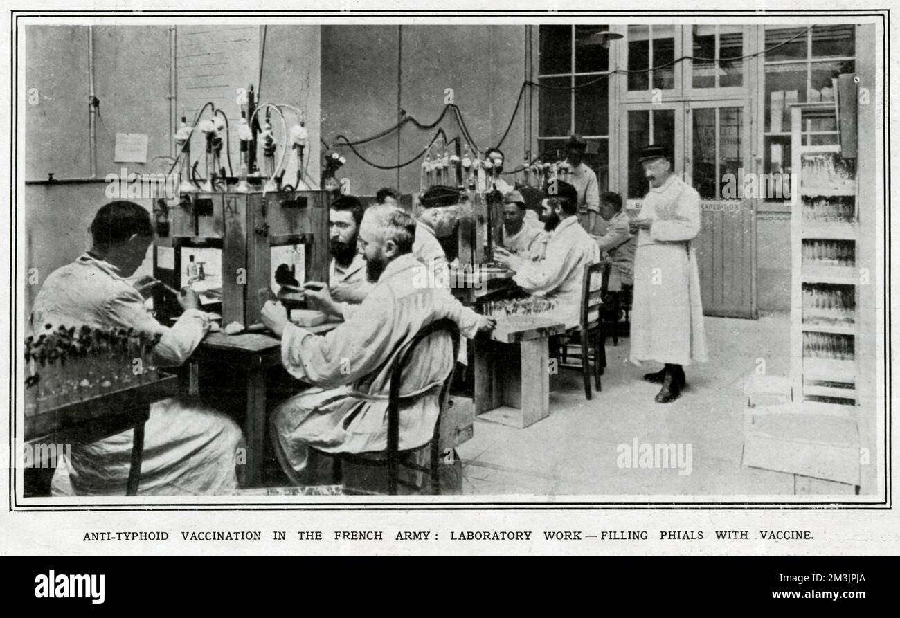 Laboratory workers filling phials with typhoid vaccine for French army