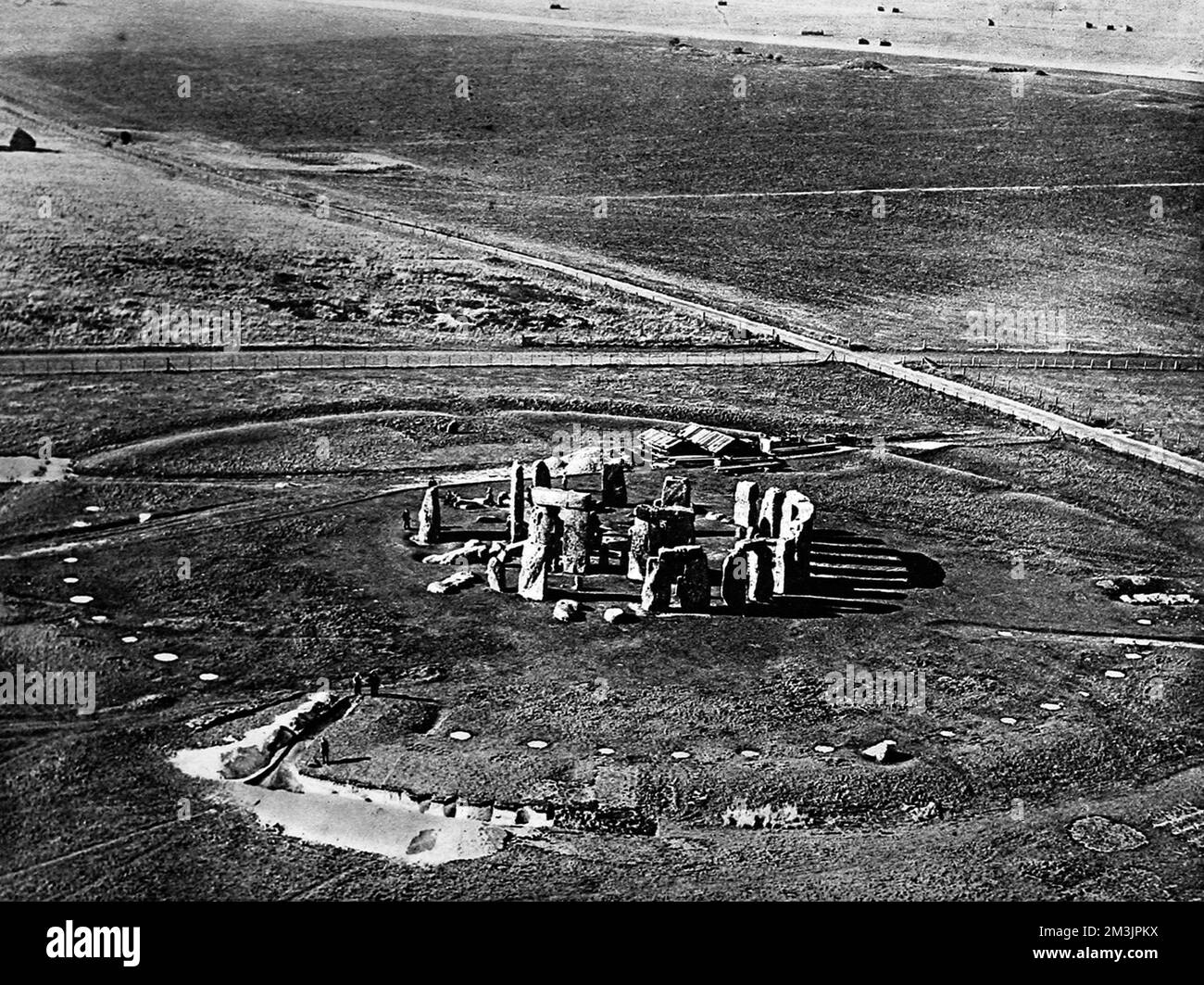 View of Stonehenge showing the excavations which were introduced after the discovery of the Aubrey Holes in 1921 (semi-circle of white patches). The holes contained cremated human remains where foreign stones once would have stood.     Date: 15th April 1922 Stock Photo