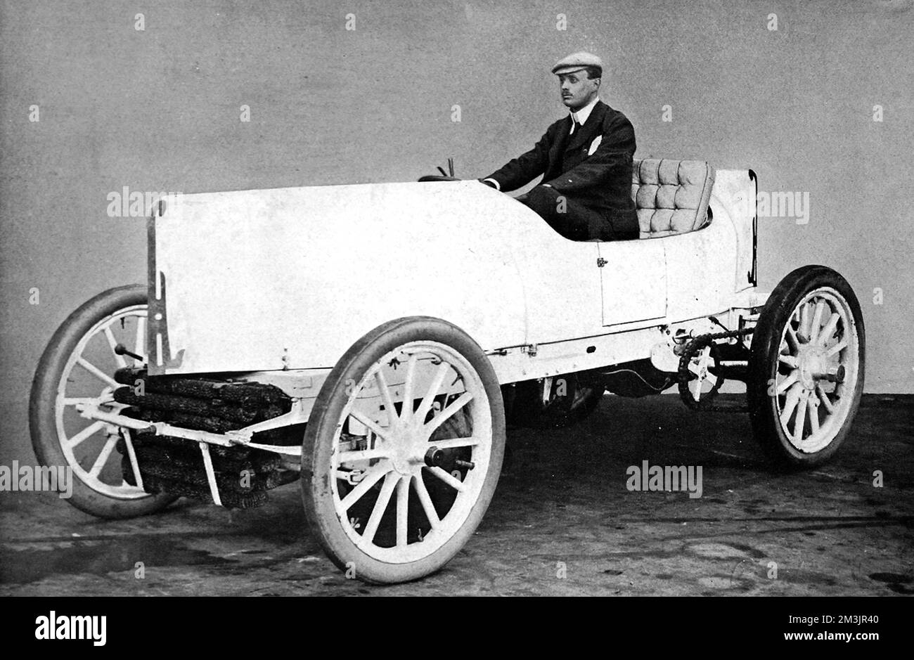 The Hon. C. S. Rolls in his special racing car.  The car beat the world record for 1 km, covering the distance in 27 secs, equal to 83mph. Rolls later died in 1910 in a plane crash.     Date: March 18th 1903 Stock Photo