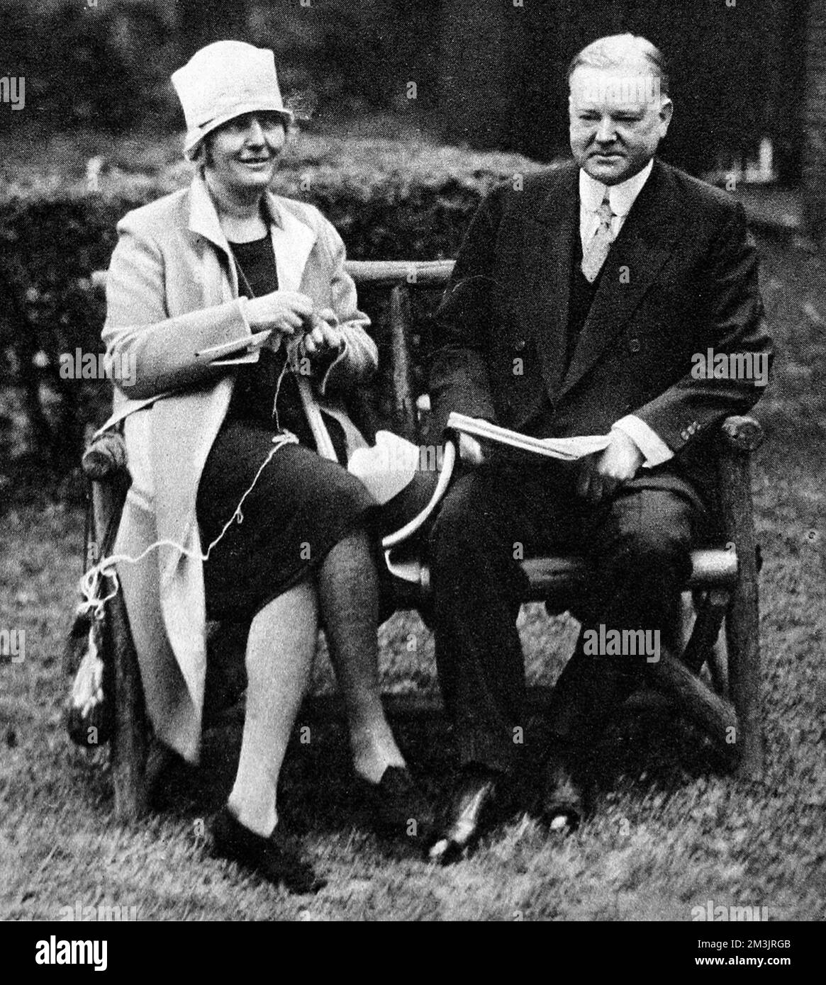The Republican Party's candidate for the Presidency of the United States. Mr Herbert Hoover and his wife in the Washington House. Born in 1874 he was involved in the relief activities in World War I. In 1928 he defeated Al Smith, the Democratic candidate and became President. Due to his demise in popularity he was defeated in his re-election bid in 1932 by Franklin D. Roosevelt.     Date: 1928 Stock Photo