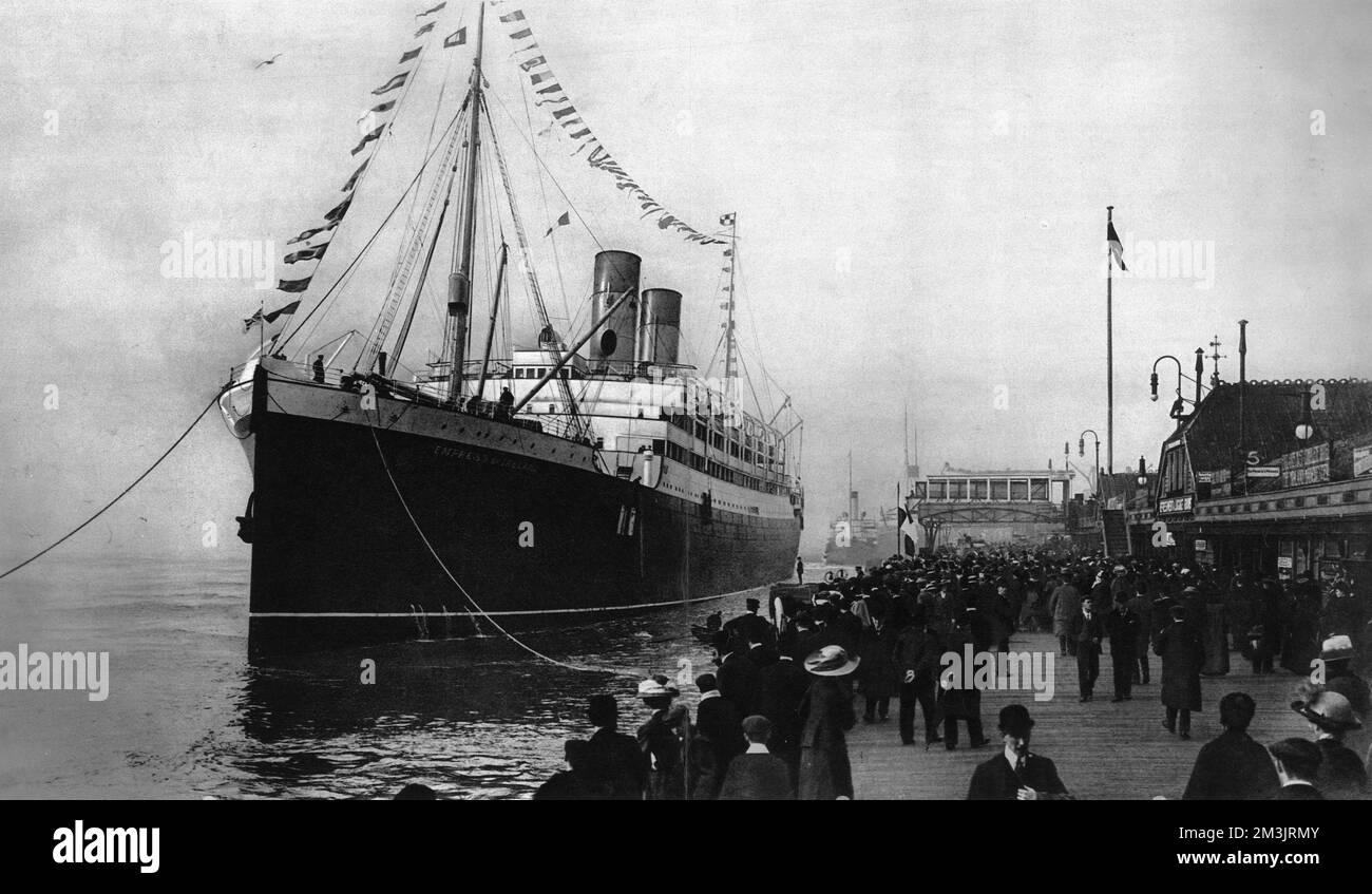 The Empress of Ireland about to set sail for Liverpool. The passenger liner sank on the 29th May 1914, while sailing down the St. Lawrence river in dense fog and colliding with the collier, Storstad. Captain Kendall sent a wireless telegram to Captain Walsh the C.P.R 's marine superintendent saying, 'Empress of Ireland. stopped dense fog, struck amidships vital spot by collier Storstad.' Over 1000 people died in the disaster, only 500 less than the Titanic.     Date: 1914 Stock Photo