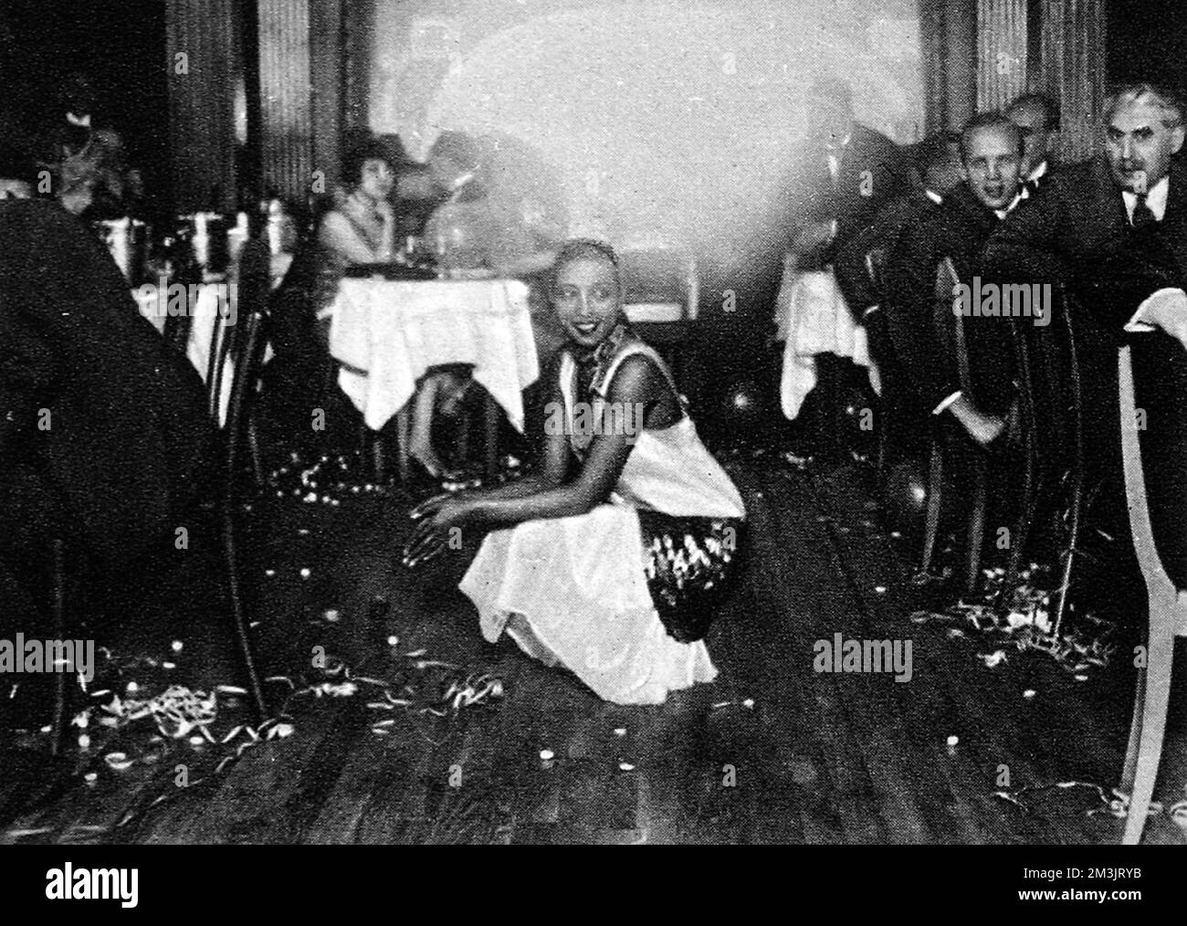 Josephine Baker (1906 1975), at her bar in Paris, surrounded by